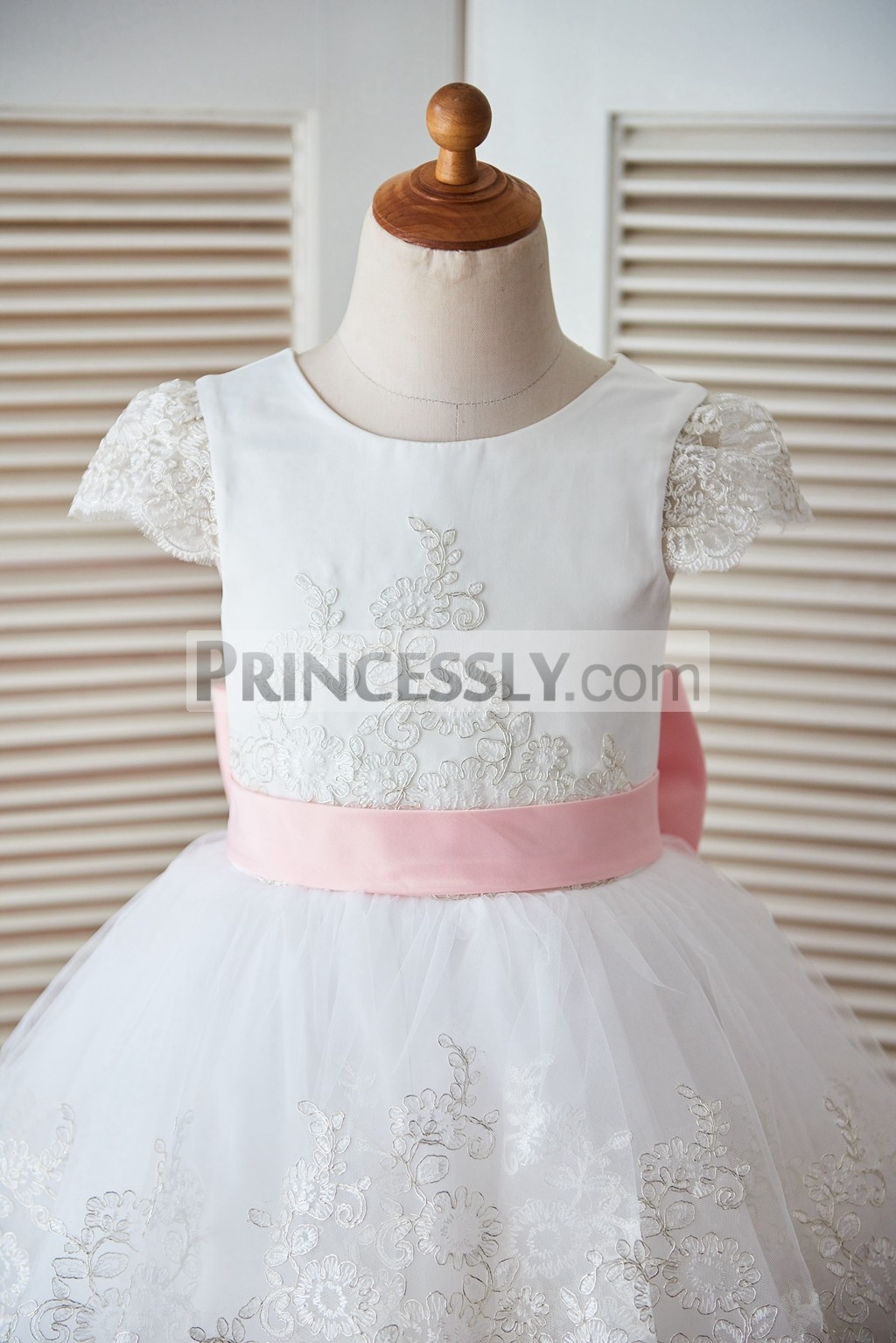 Sheer lace cap sleeves ivory satin bodice with blush pink belt 