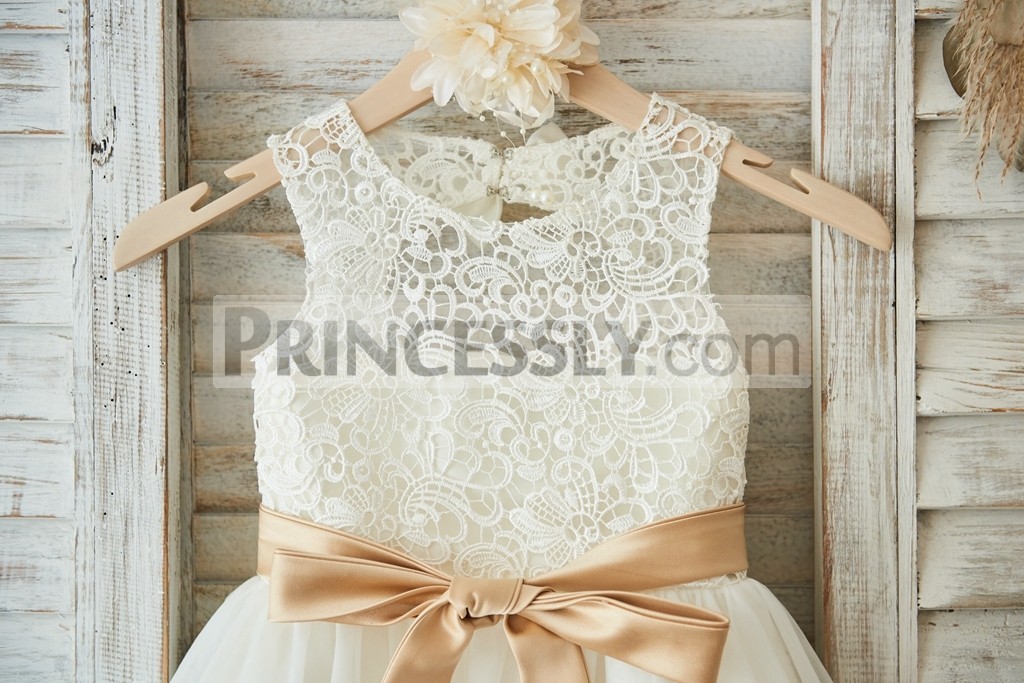 Ivory lace overlay bodice with champagne satin sash