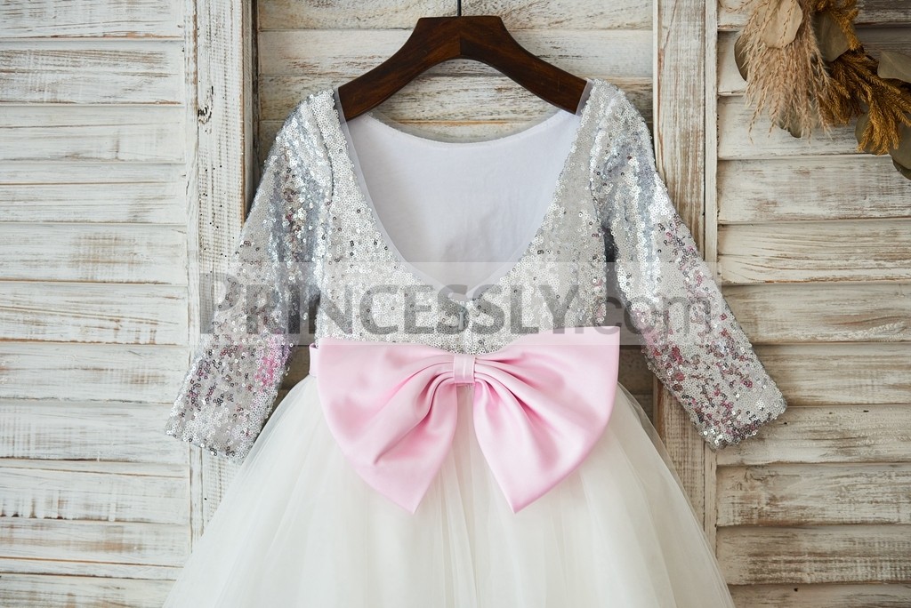 Exposed V neck with pink bow on back