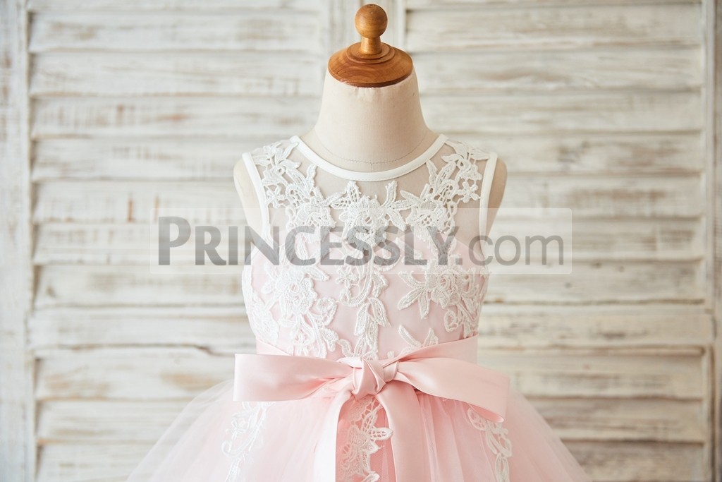 Sheer lace neck inside sweetheart pink lined bodice with sash