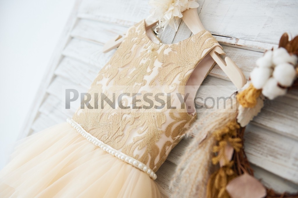 Gold lace bodice with pearls sash