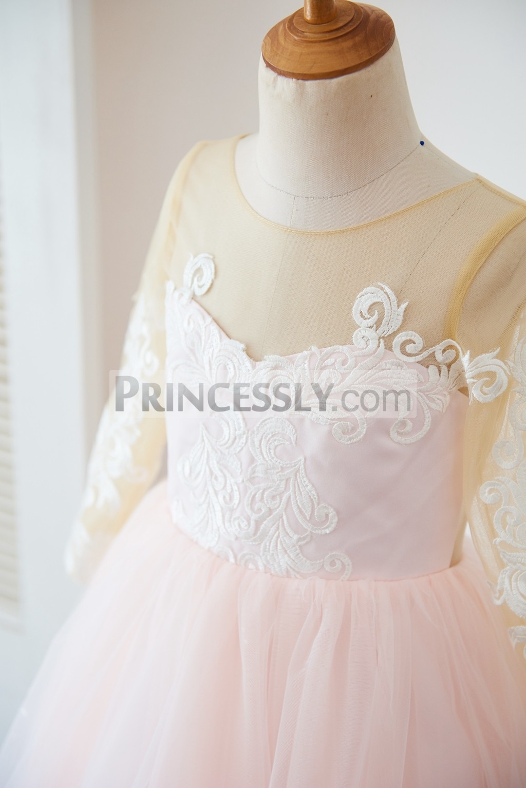 Sheer tulle neck inside sweetheart pink lining bodice