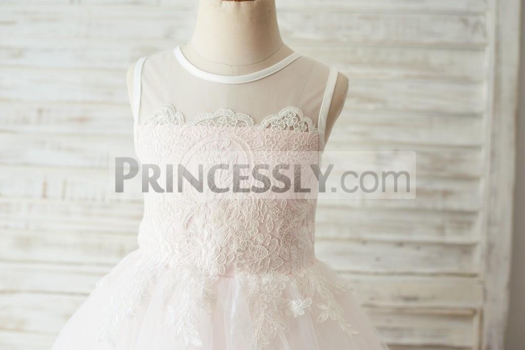 Ivory lace appliques overlay pink lining bodice