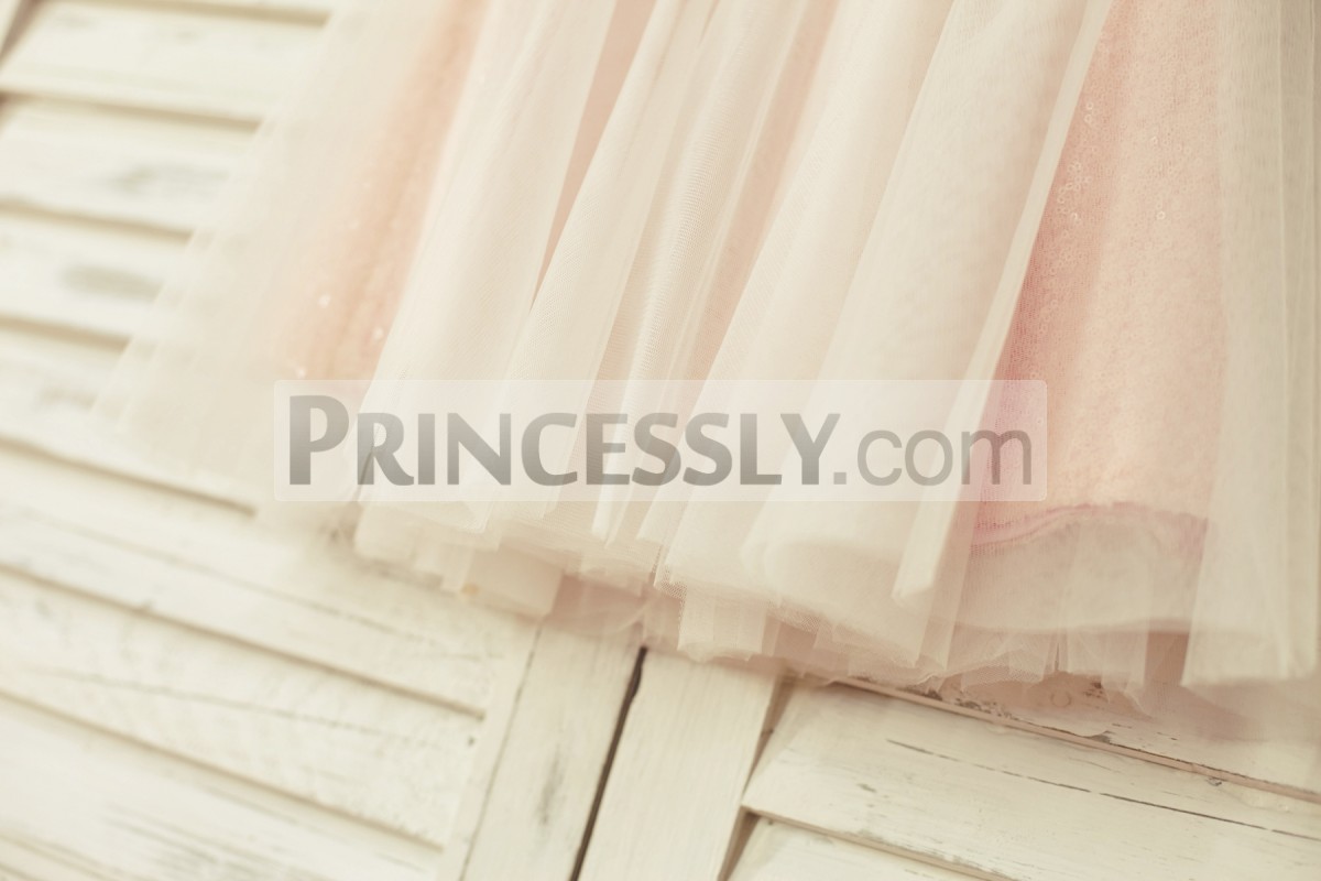 Ivory tulle skirt stick out of sequined lining