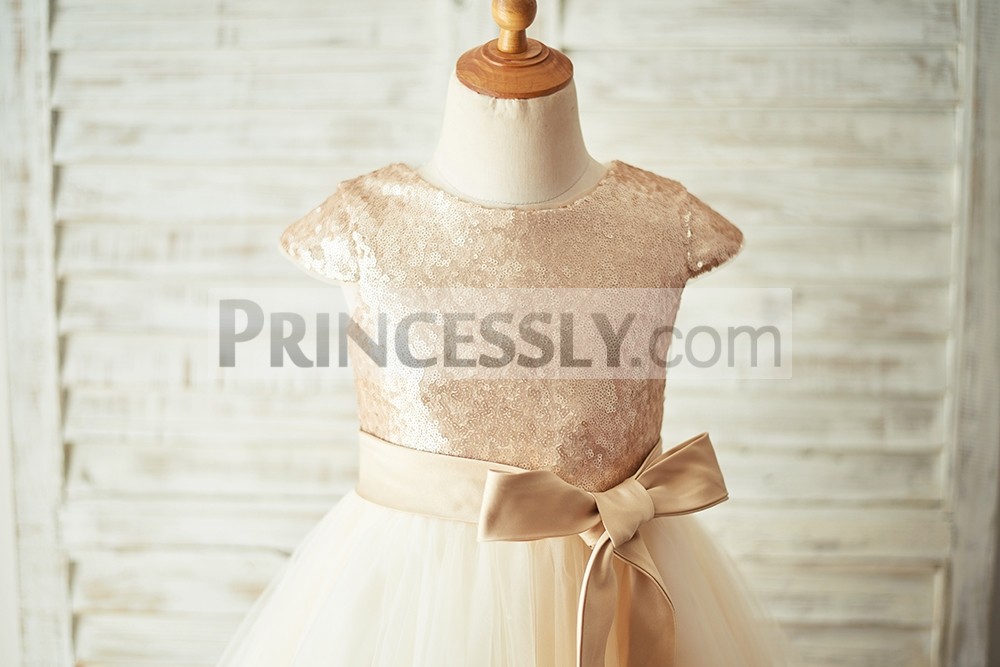 Cap sleeevs champagne sequins bodice with sash